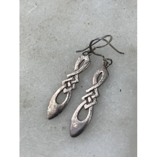 218 - A PAIR OF ORNATE SILVER DROP EARRINGS