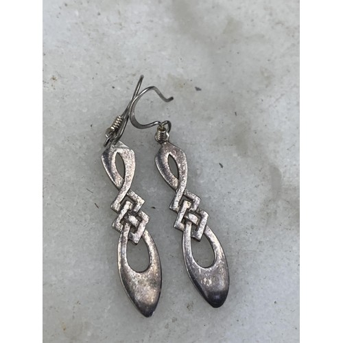 218 - A PAIR OF ORNATE SILVER DROP EARRINGS