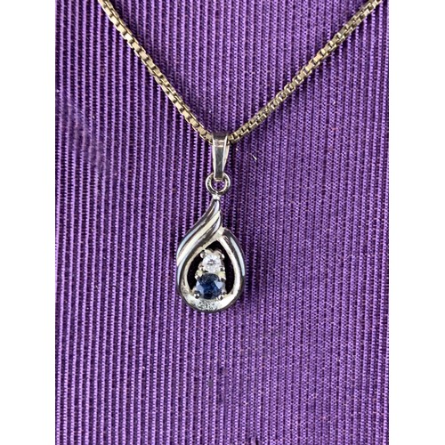 261 - A 925 SILVER CHAIN & A SILVER AND REAL SAPPHIRE PENDANT