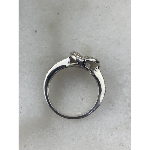 274 - A SILVER GEMSET LOVE KNT RING SIZE O