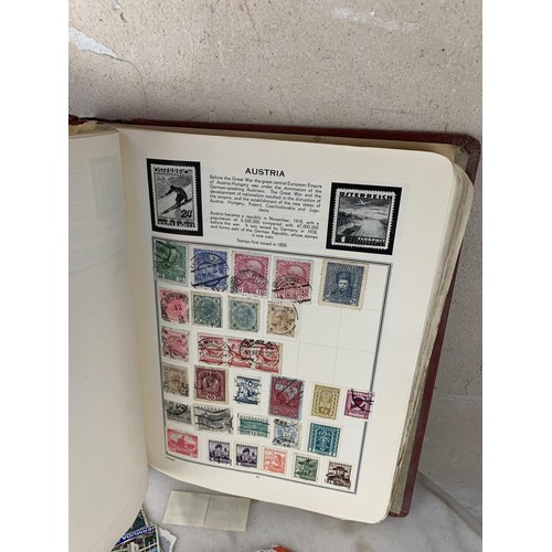 316 - A STAMP ALBUM & A LARGE COLLECTION OF MIXED STAMPS