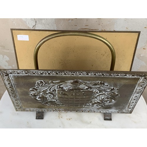 341 - A VERY OLD HEAVY BRASS PAPER RACK WITH COAT OF ARMS