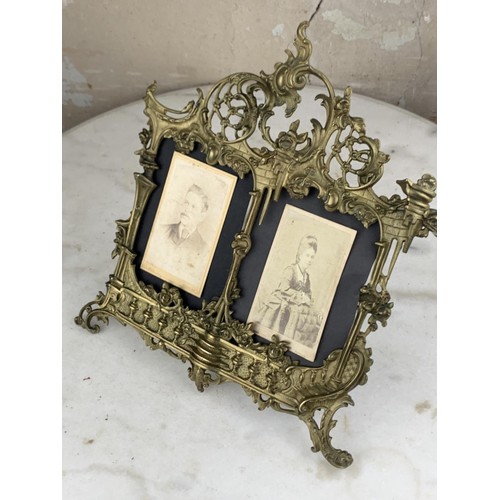 349 - VERY ORNATE DOUBLE ANTIQUE BRASS PHOTO FRAME 12 X 10