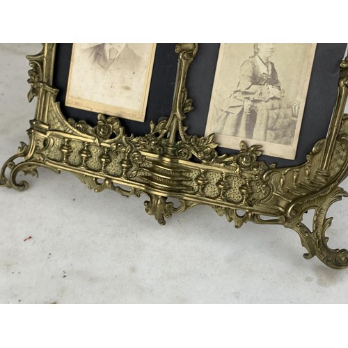 349 - VERY ORNATE DOUBLE ANTIQUE BRASS PHOTO FRAME 12 X 10