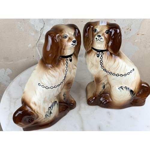 355 - A PAIR OF STAFFORDSHIRE DOGS 13