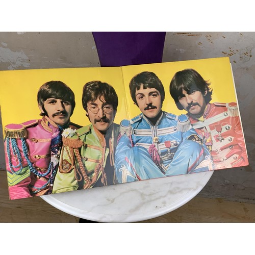 370 - A 1967 SARGEANT PEPPERS ALBUMN BY THE BEATLES WITH PETER BLAKE CUT OUT BOARD