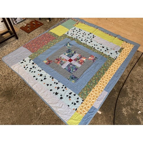 372 - AN ANTIQUE PATCHWORK THROW 71 x 63