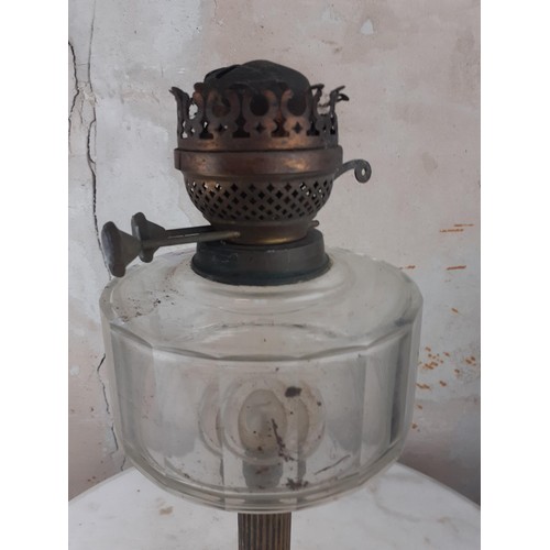 386 - A BRASS PILLAR OIL LAMP 17