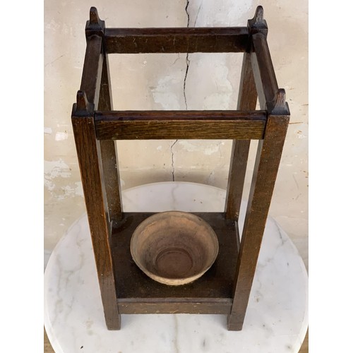 387 - AN ANTIQUE STICK STAND WITH A TEROCCA BOWL 24