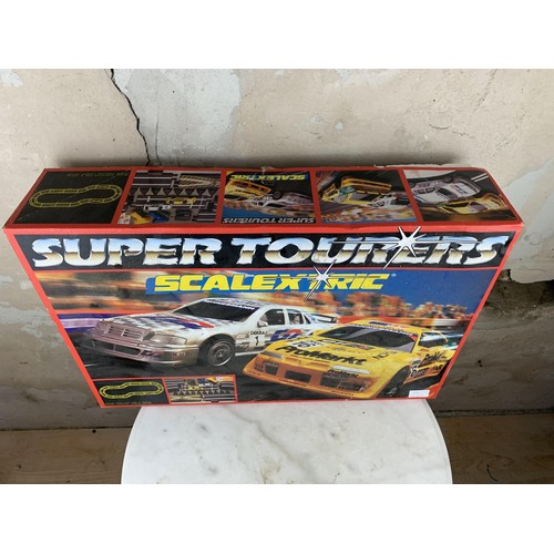 389 - A BOXED SET OF SCALEXTRIC SUPER TOURERS