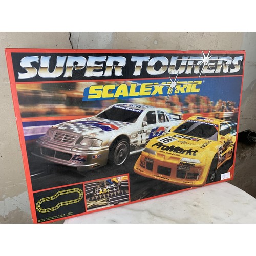 389 - A BOXED SET OF SCALEXTRIC SUPER TOURERS