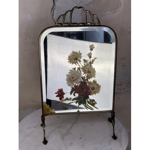 398 - AN ANTIQUE BRASS MIRRORED HAND PAINTED FIRESCREEN