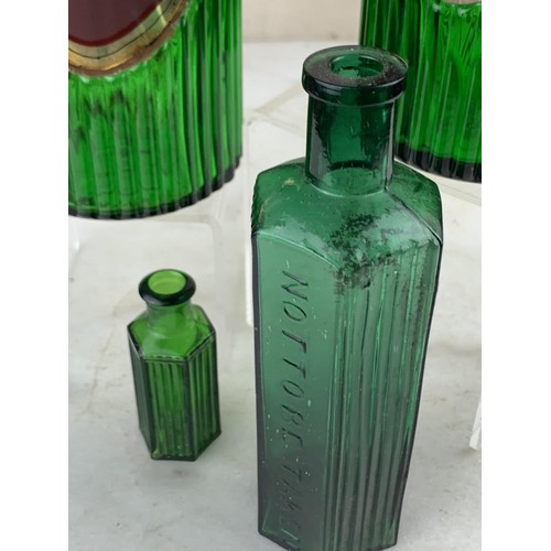 515 - 4 GREEN GLASS CHEMIST BOTTLES tallest 8