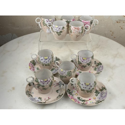 534 - A SET OF 10 ORIENTAL EGGSHELL CUPS WITH 4 SAUCERS