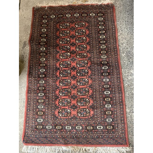 776 - A HAND STICTHED BURNT ORANGE STYLE PAKISTANI WOOLEN RUG 56 x 38