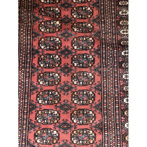 776 - A HAND STICTHED BURNT ORANGE STYLE PAKISTANI WOOLEN RUG 56 x 38