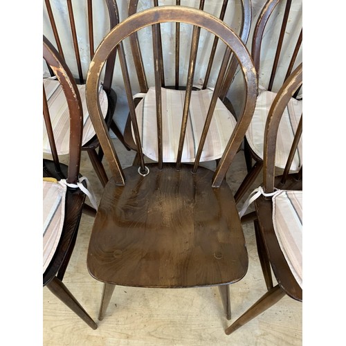 429 - A SET OF 6 STICK BACK ERCOL CHAIRS