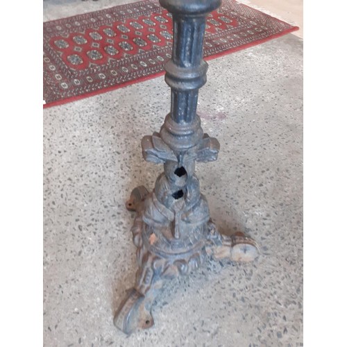 519A - AN ORNATE CAST IRON TABLE BASE