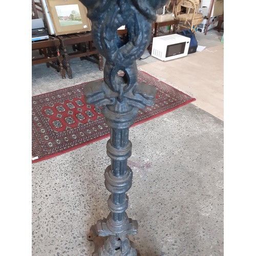 519A - AN ORNATE CAST IRON TABLE BASE