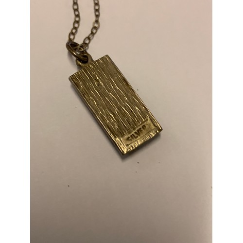 279 - A SILVER INGOT ON A SILVER CHAIN