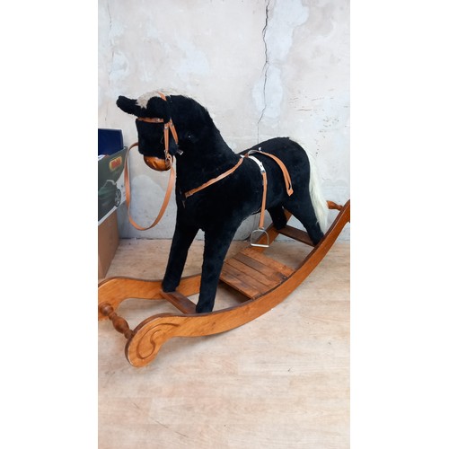 12 - A CHILDS LARGE ROCKING HORSE