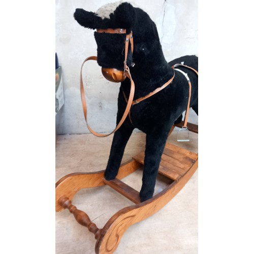 12 - A CHILDS LARGE ROCKING HORSE