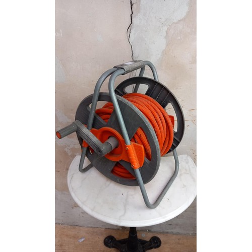 15 - GARDEN HOSE ON REEL