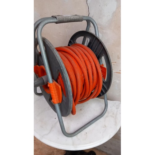 15 - GARDEN HOSE ON REEL