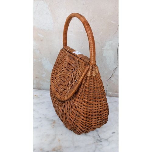 45 - A MID 20th CENTURY WICKER SHOPPING BASKET