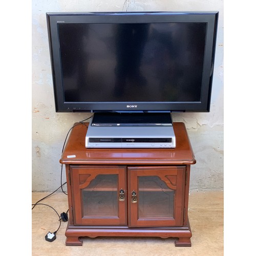 57 - A SONY BARVIA T.V, DVD PLAYER/RECORDER ON A YEWWOOD TV UNIT