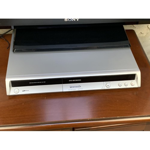 57 - A SONY BARVIA T.V, DVD PLAYER/RECORDER ON A YEWWOOD TV UNIT