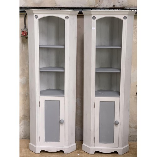 69 - A PAIR OF PAINTED PINE CORNER CUPBOARDS