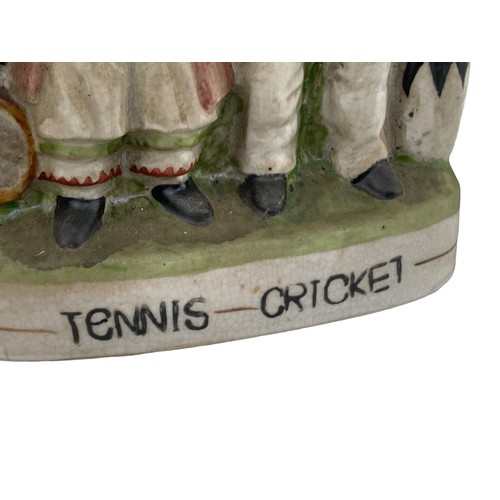 129 - A STAFFORDSHIRE FLATBACK ORNAMENT TENNIS& CRICKET