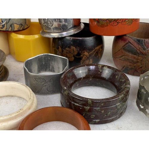 117 - A MIXED LOT OF NAPKIN RINGS