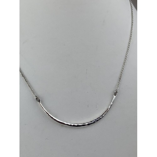 218 - A SILVER CURVE FRONT NECKLACE  WITH 2 CLASPS