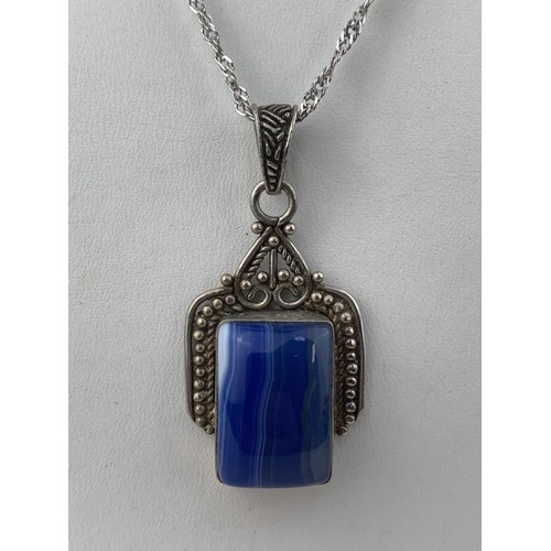 295 - A LAPIS SILVER PENDANT ON SILVER CHAIN