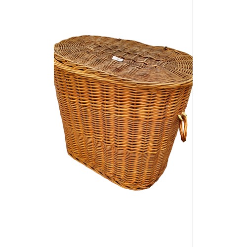 97 - A LARGE WICKER BASKET