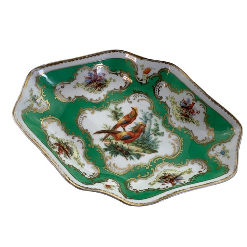 329 - A SHAPED BIRDS OF PARADISE DISH WITH MARKINGS TO THE BASE 8X6