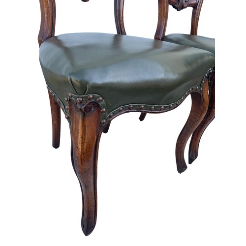 386 - A PAIR OF VICTORIAN WALNUT SIDECHAIRS WITH GREEN LEATHER SEATS