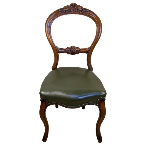 386 - A PAIR OF VICTORIAN WALNUT SIDECHAIRS WITH GREEN LEATHER SEATS