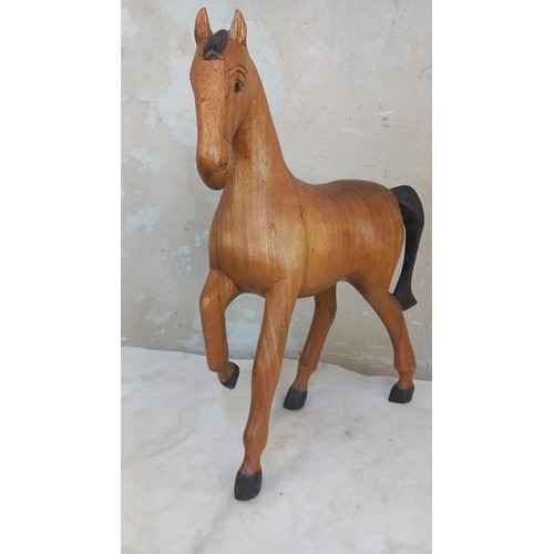 388 - A WOODEN HORSE STANDS 14