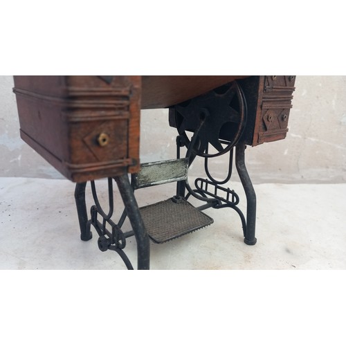 404 - A MINITURE TABLE SEWING MACHINE (ORNAMENTAL)