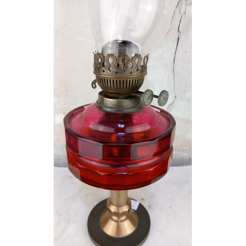 423 - CRANBERRY GLASS BOWL OIL LAMP (SLIGHT CHIP IN BOWL)