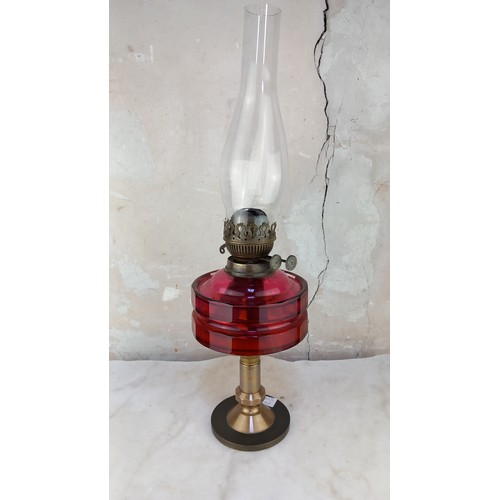 423 - CRANBERRY GLASS BOWL OIL LAMP (SLIGHT CHIP IN BOWL)