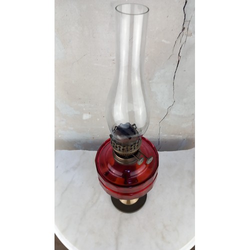 423 - CRANBERRY GLASS BOWL OIL LAMP (SLIGHT CHIP IN BOWL)