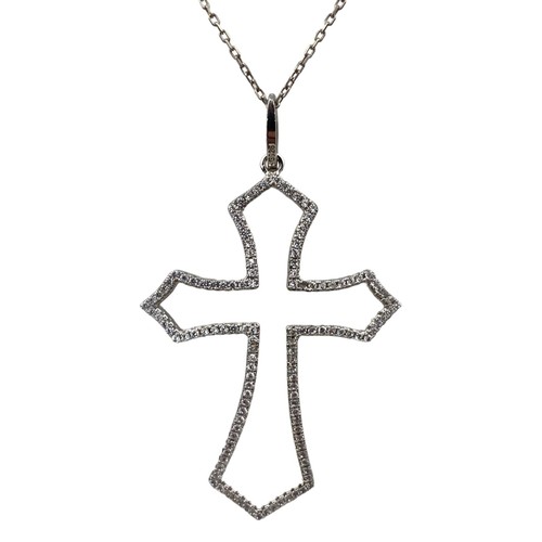 580 - A SILVER CROSS AND SILVER CHAIN CROSS IS ENCRUSTED WITH DIAMANTE STONES