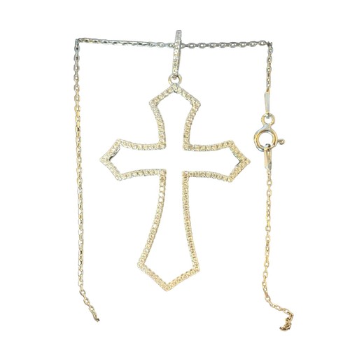 580 - A SILVER CROSS AND SILVER CHAIN CROSS IS ENCRUSTED WITH DIAMANTE STONES