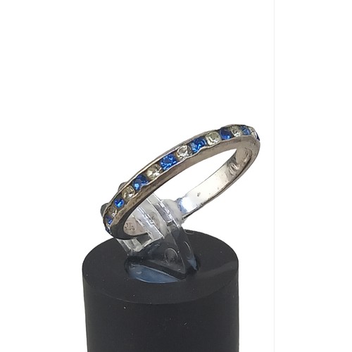 572 - A SILVER ETETRNITY RING SET WITH BLUE & WHITE STONES