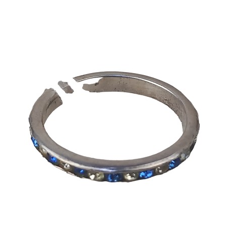 572 - A SILVER ETETRNITY RING SET WITH BLUE & WHITE STONES