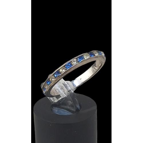 572 - A SILVER ETETRNITY RING SET WITH BLUE & WHITE STONES